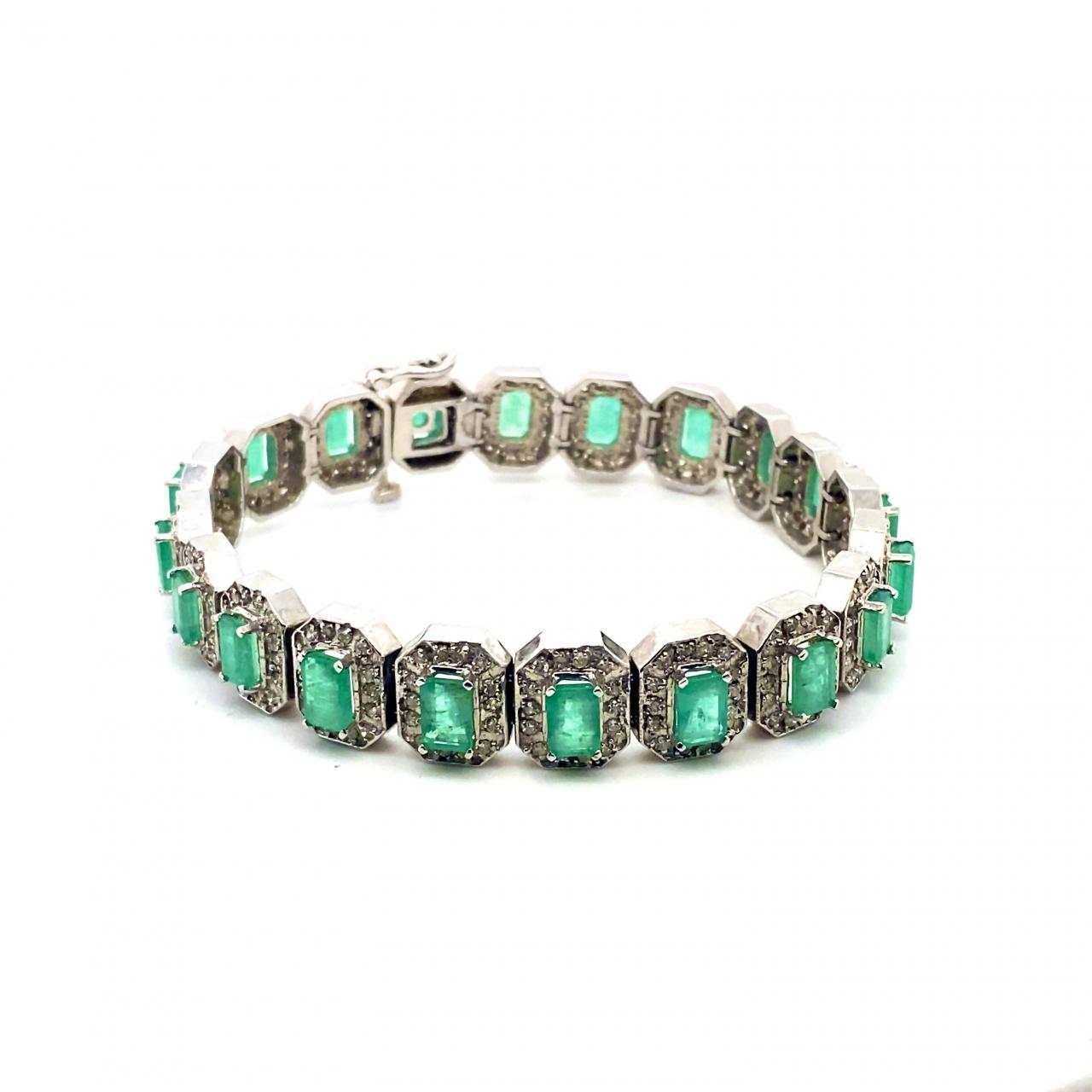 10.22ctw Emerald and 1.68ctw Round Diamond Bracelet  14K White Gold 7"